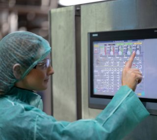 A Lakeland Dairies employee working.