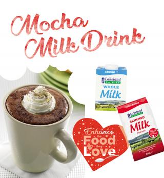 Text reads: Mocha Milk Drink with image of a cake-in-mug dessert with whipped cream on top, with images of 500ml carton of Lakeland Dairies Whole Milk and 2kg bag of Lakeland Dairies Skimmed Milk Powder