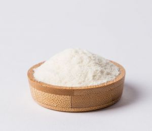 Lakeland Dairies cream powder in a wooden bowl.