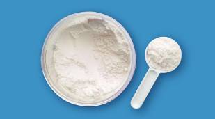 acid casein in a bowl with scoop