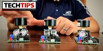 Man going to touch 1 of 3 deconstructed black products 