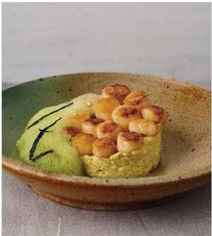 Scallops on a bed of flavoured rice, made with Lakeland Dairies products