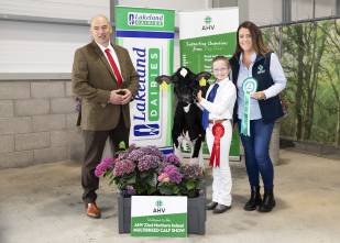 Ella Kennedy and her calf after winning at a show.