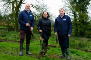 Lakeland Dairies Chairman Niall Matthews, Marina Conway CEO of the Western Forestry Co-op and Lakeland Dairies CEO Colin Kelly all stood with shovels and wellies having planted the trees as part of the Lakeland Dairies sustainability initiative.