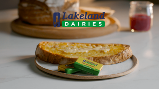 Buttered toast with Lakeland Dairies mini butter foil portions and Lakeland Dairies logo