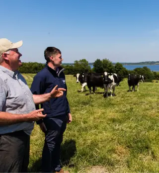 Lakeland Dairies team member Eamon Duignan on the farm of a milk supplier.